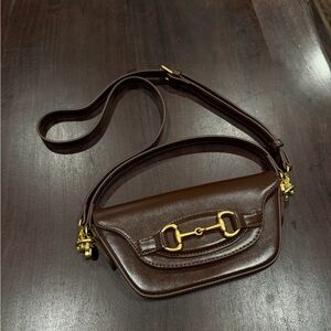 Anthropologie brown bag with buckle